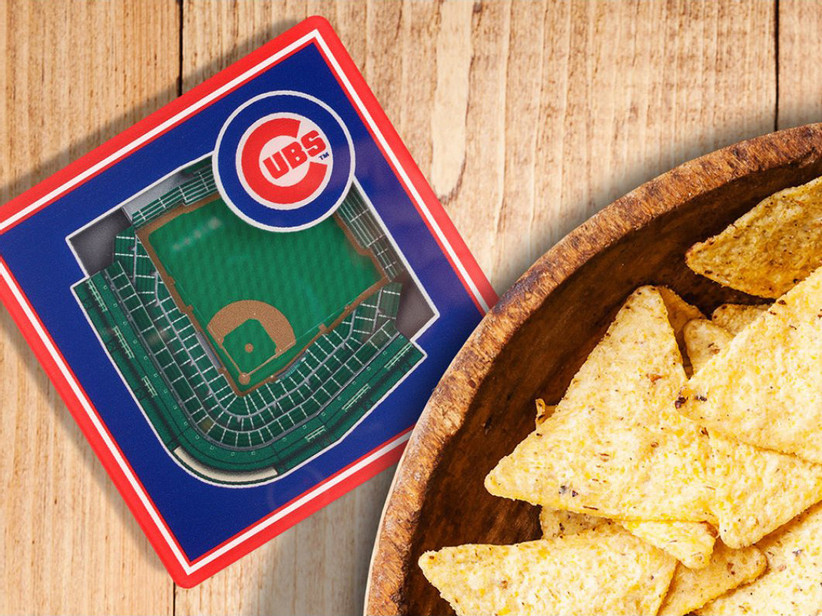 Unique baseball stadium coaster next to a bowl of chips