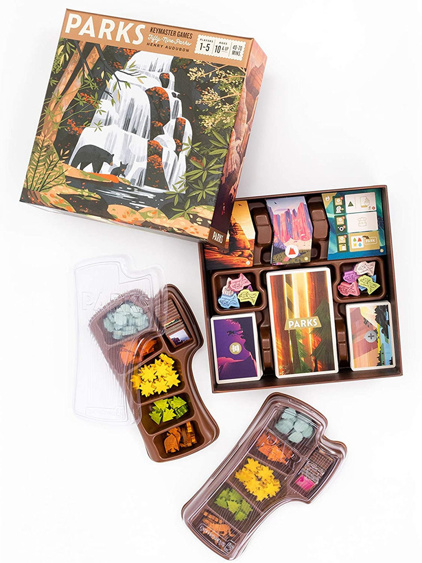 Beautifully illustrated PARKS game box with picture of bears and a waterfall