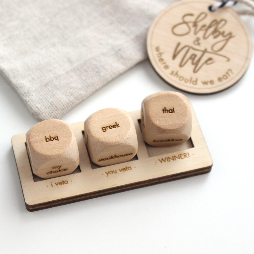 Set of three wooden dice with different dinner suggestions