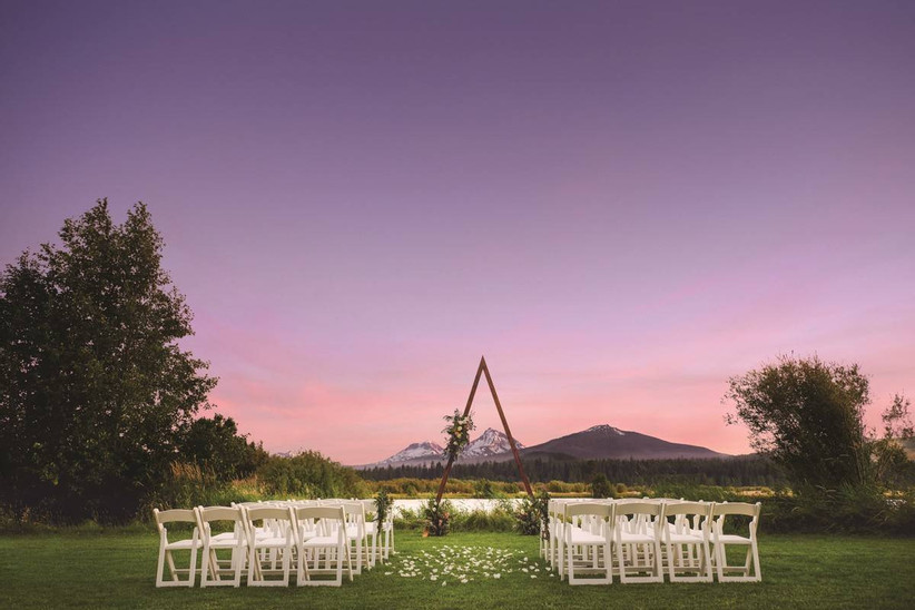 wedding ceremony with tipi ceremony structure