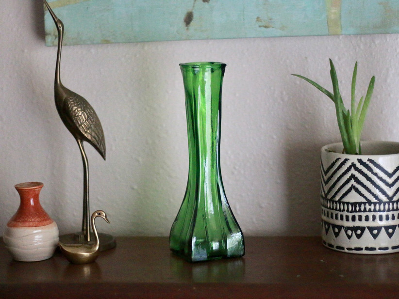 green vase on table
