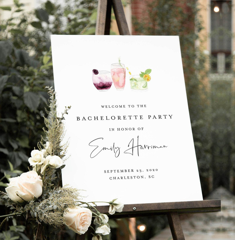 Personalized bachelorette party welcome sign with white background, elegant font, and watercolor illustration of cocktails