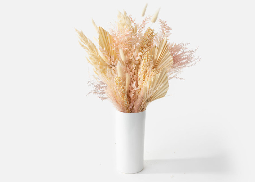 White vase filled with blush and beige dried blooms Mother's Day gift for wife