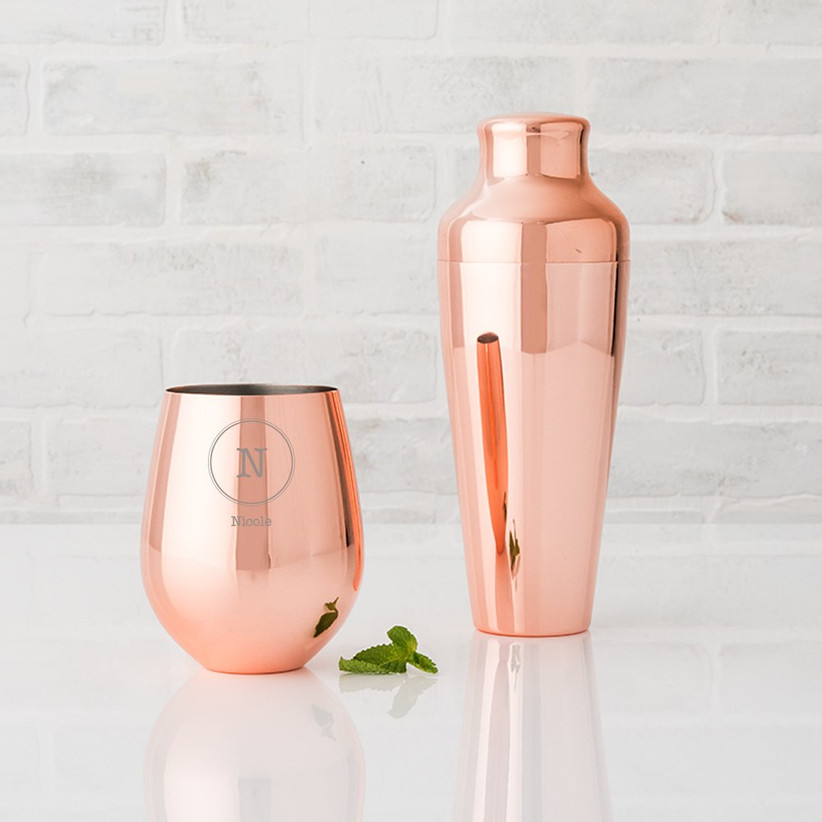 Copper tumbler personalized with name Nicole and initial N next to copper cocktail shaker