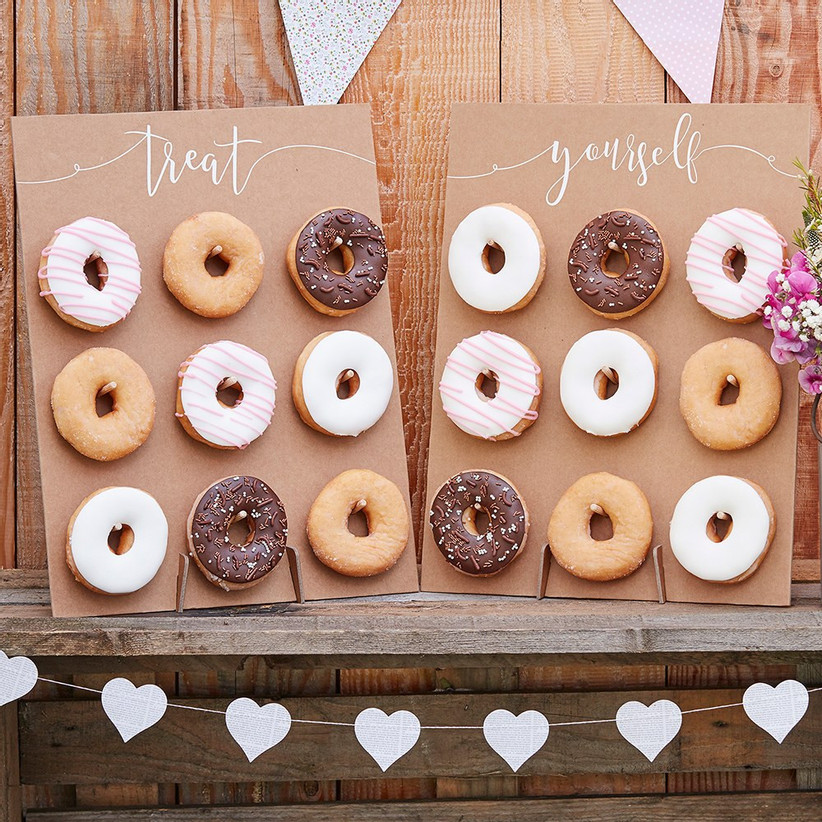 Two donut boards with nine donuts each that read Treat Yourself