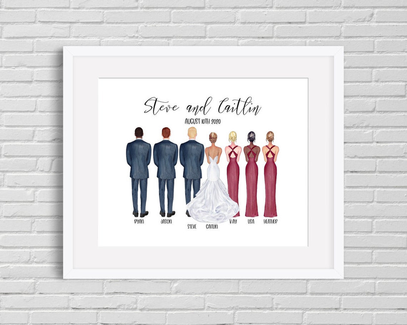 Framed illustrated portrait of couple and their wedding party with couple's names and wedding date