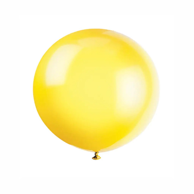 Large lemon yellow latex balloon on white background