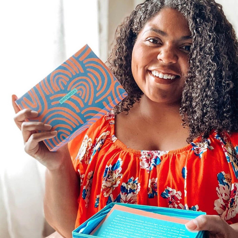 Women smiling holding Birchbox delivery