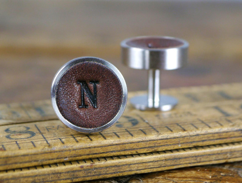 Dark brown leather cuff links with N initial