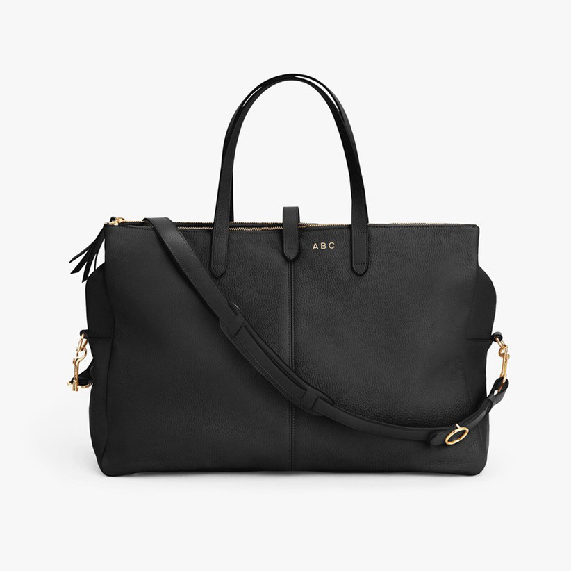 Black leather weekend bag with gold ABC monogram