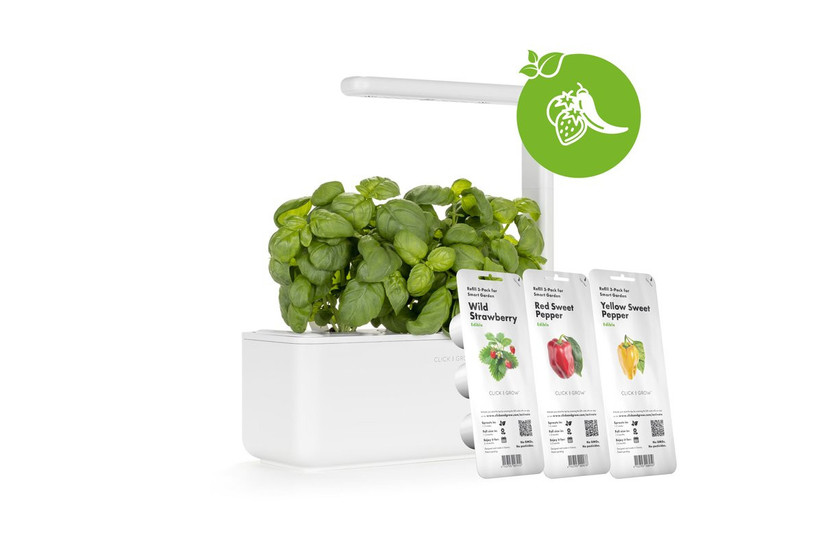 white indoor garden set with three seed packets