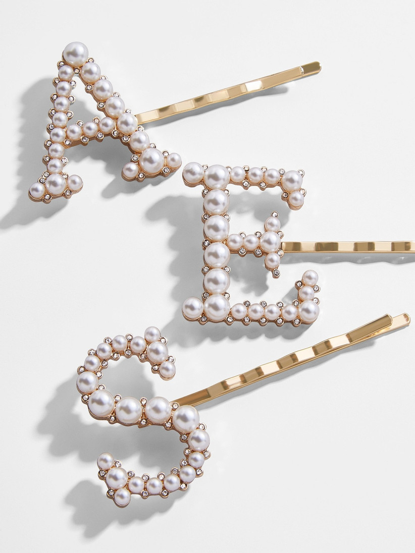pearl hairpins in the shape of letters