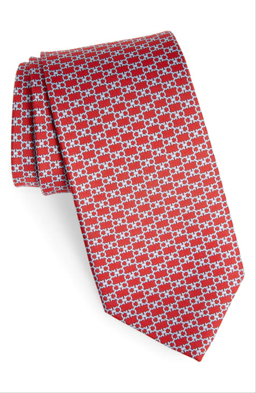 red tie with silver circle pattern