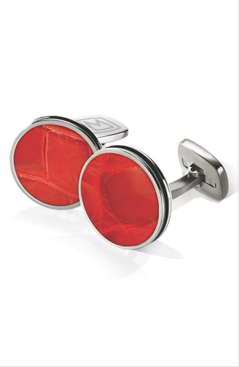 red circular cufflinks with silver hardware