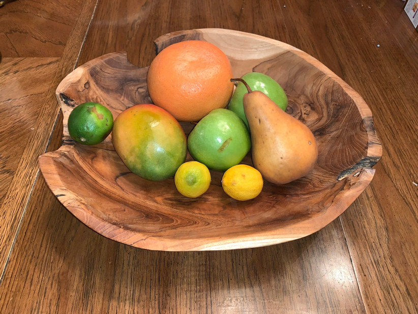 wooden bowl filled with fruit