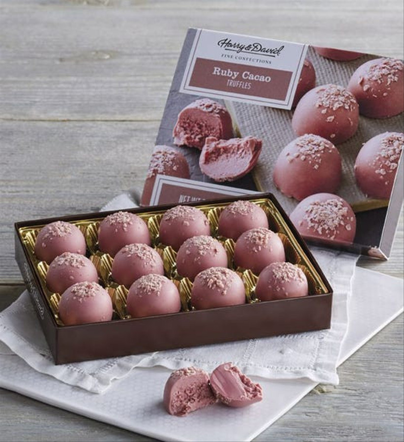 a box of pink chocolate truffles