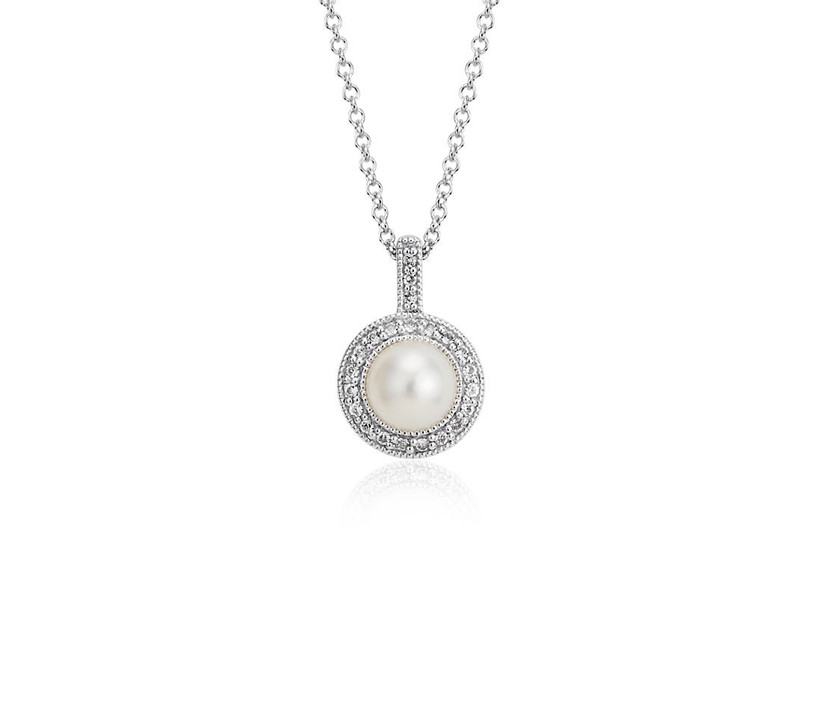 pearl necklace surrounded by halo of diamonds