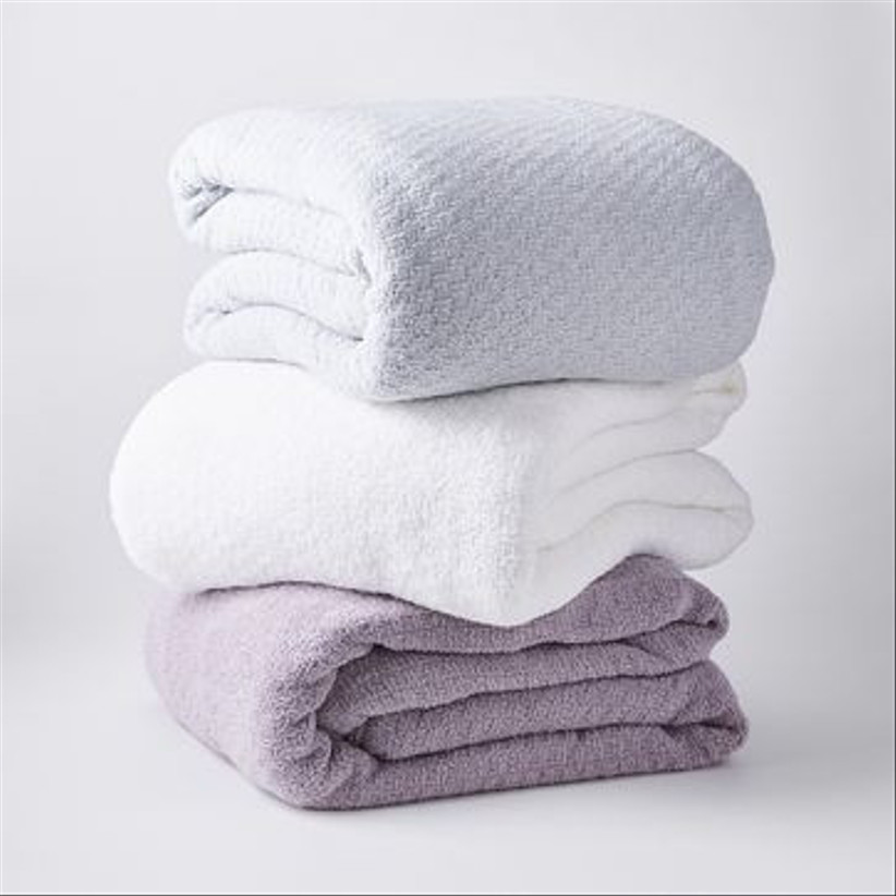 stack of three weighted blankets