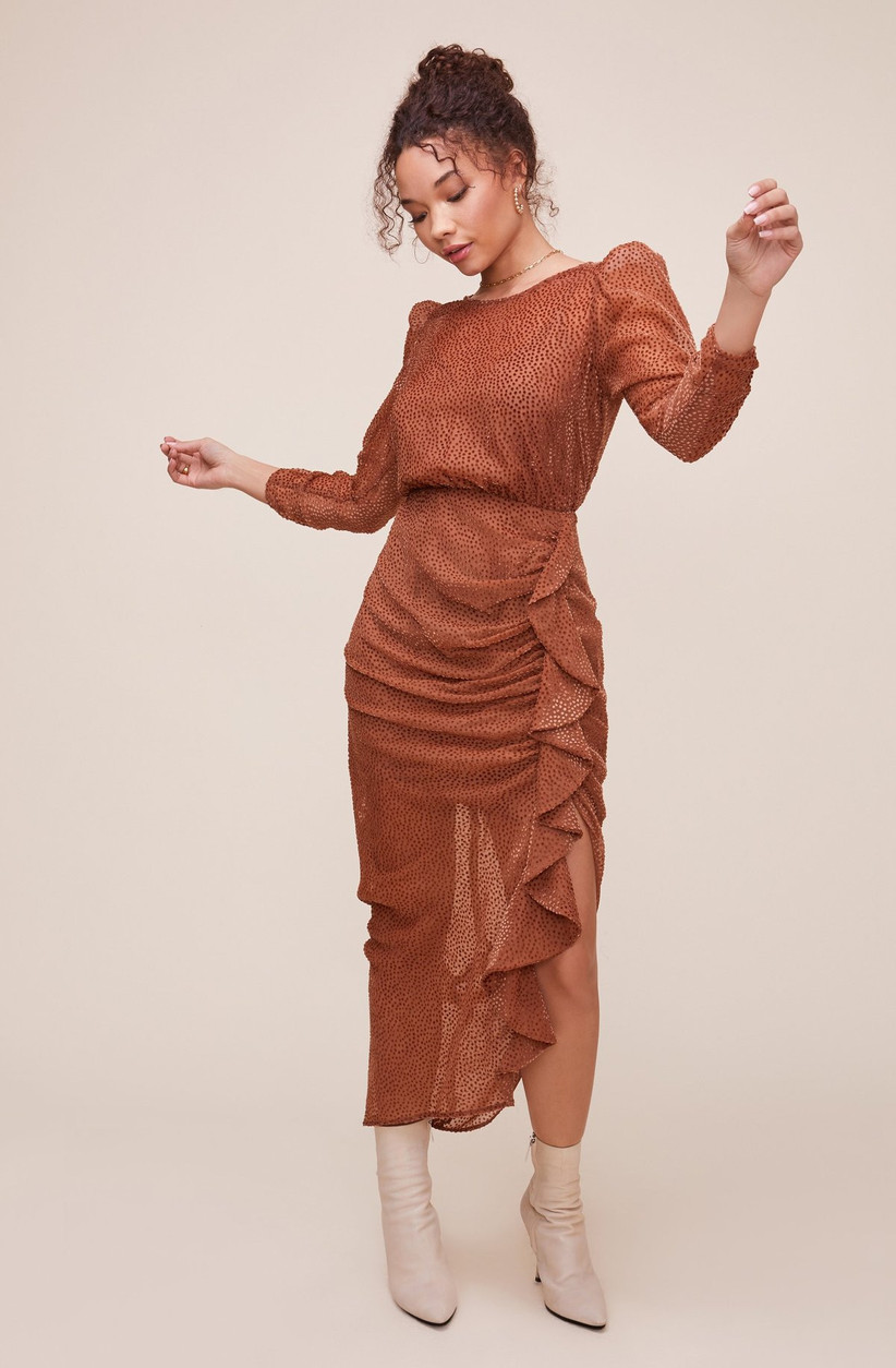 rust orange engagement party dress with bodycon silhouette and ruffled skirt with slit on side