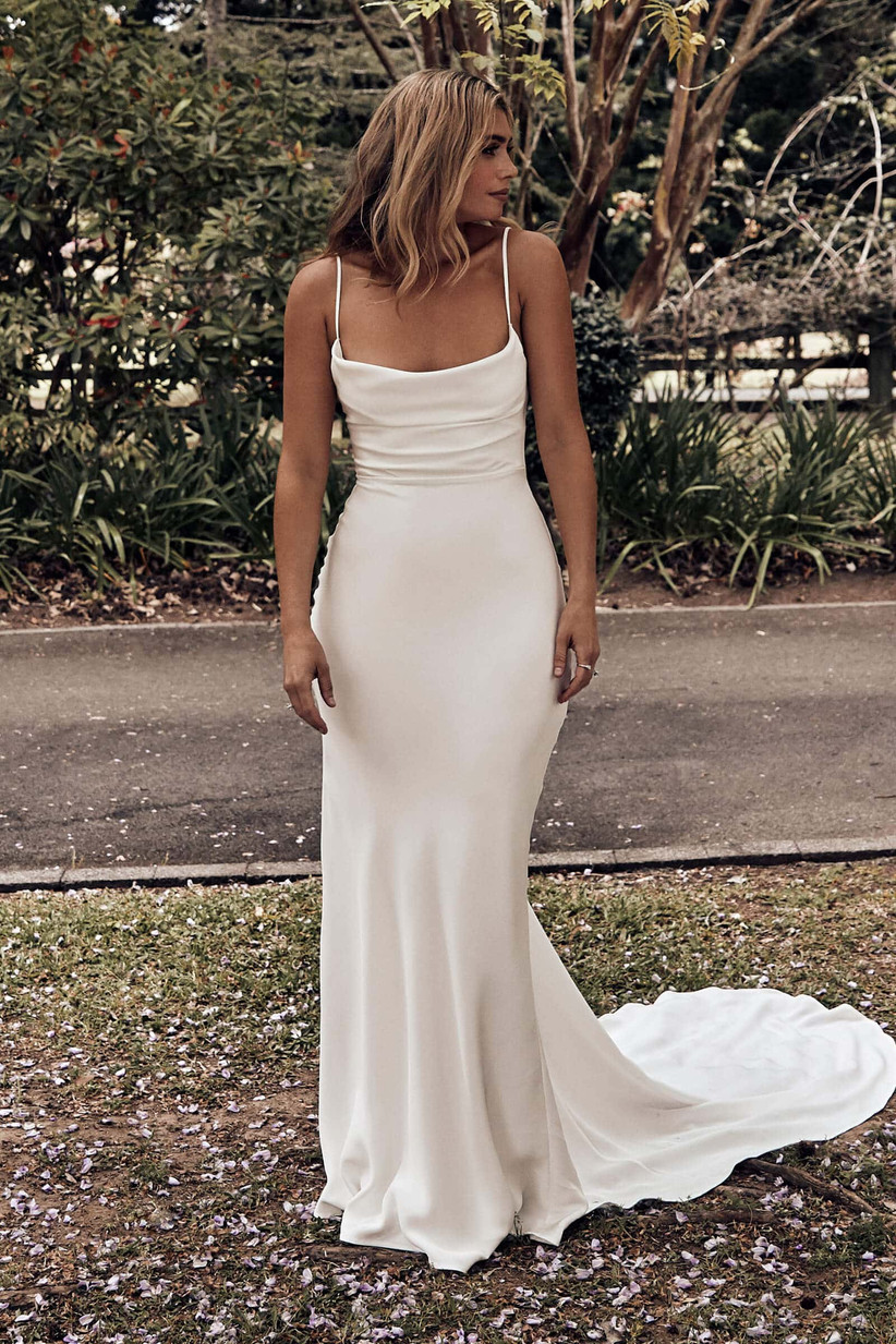 Model wearing timeless silk slip wedding gown