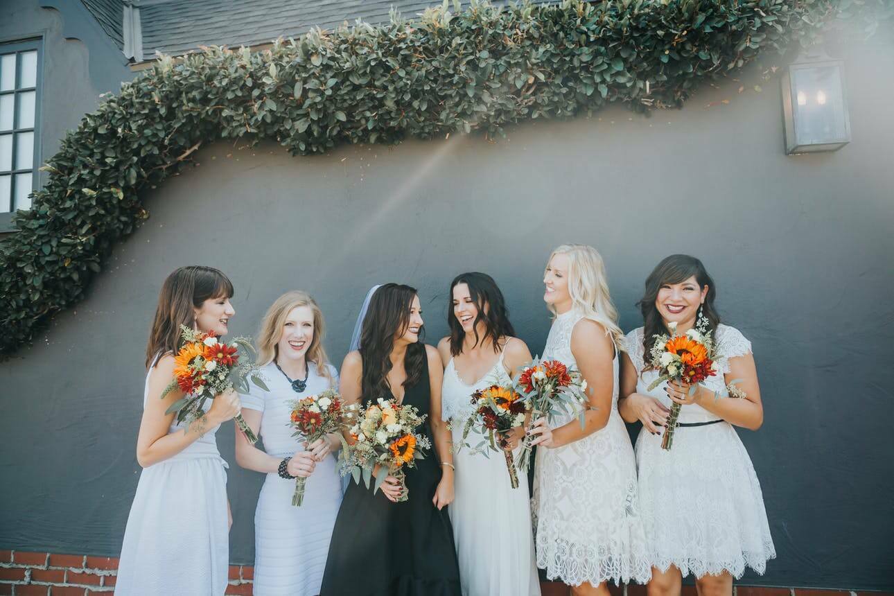 White bridesmaid dresses with the bride in black