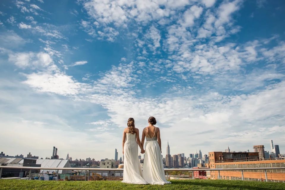 Rooftop wedding ceremony with a view of the NYC skyline at The William Vale, Brooklyn